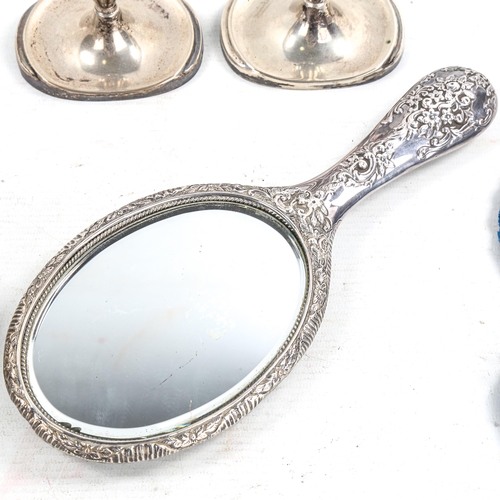 579 - Various silver, including Continental table candlesticks, dressing table brushes, hand mirror and ev... 