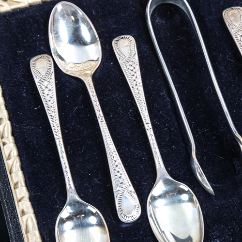 587 - A cased set of 6 silver teaspoons and a pair of matching sugar tongs, by Cooper Brothers & Sons Limi... 