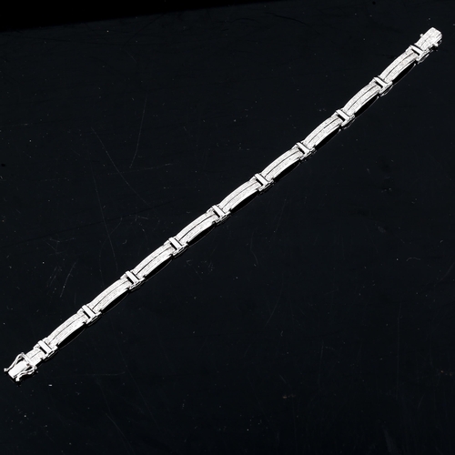 592 - A modern 9ct white gold diamond panel bracelet, set with single cut diamonds, bracelet length 18.5cm... 