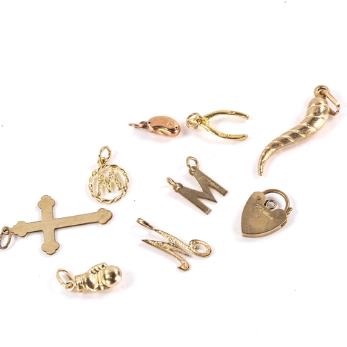 606 - Various 9ct gold charms and pendants, including wishbone, magic bean, boxing glove etc, 9.7g total