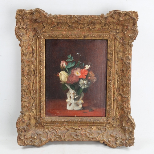 1853 - A 19th century oil on canvas, still life of flowers, in gilt frame, indistinctly signed, dated 1892,... 