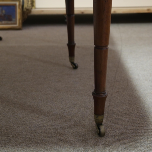 1158 - A Georgian mahogany drop leaf extending dining table, with reeded edge, raised on 6 ring turned legs... 