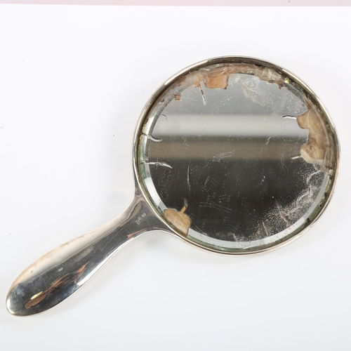 107 - An early/mid 20th century Chinese export silver dressing table hand mirror, by Wang Hing, relief emb... 