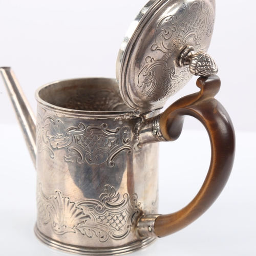 120 - A George III silver argyle, cylindrical form with reeded rim and relief embossed foliate decoration ... 