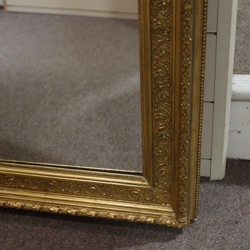 1336 - A large Victorian gilt-gesso framed rectangular wall mirror, 162cm x 111cm