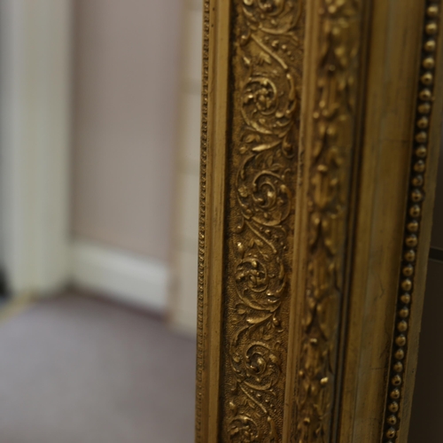 1336 - A large Victorian gilt-gesso framed rectangular wall mirror, 162cm x 111cm