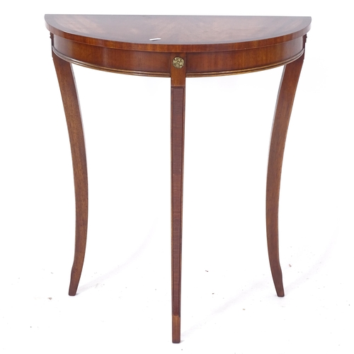 2061 - A small mahogany console table, on cabriole legs, with ormolu mounts, W61cm, H70cm, D30cm