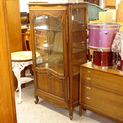 2530 - A French oak vitrine cabinet, with single-glazed and panelled door, W83cm, H162cm, D41cm