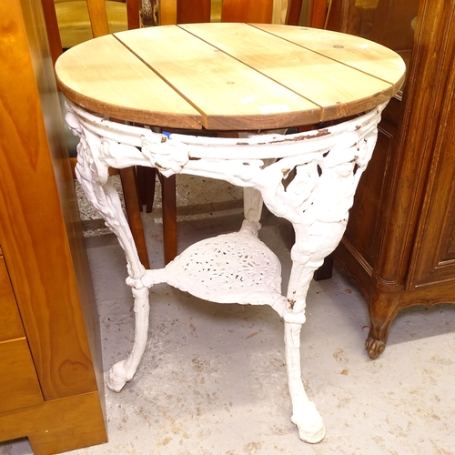 2531 - A circular pub table, on embossed and pierced cast-metal base, W59cm, H76cm