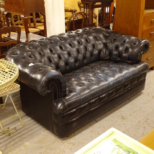 2534 - A blue leather allover button-upholstered rollover arm Chesterfield settee, L170cm, H70cm, seat heig... 