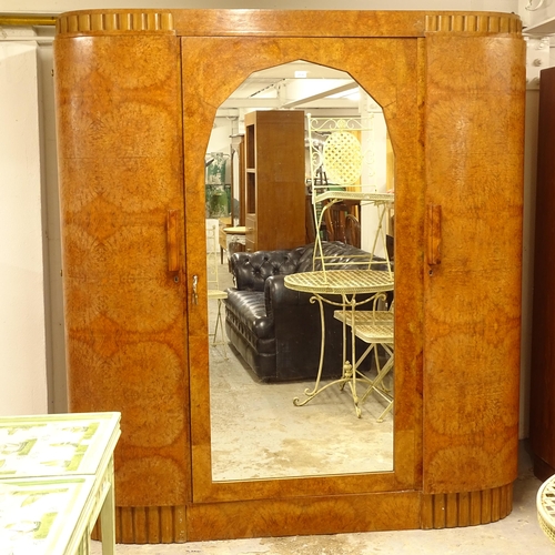 2536 - A French Art Deco burr-walnut bow-end armoire, with a central arch-top mirror door, L178cm, H192cm, ... 