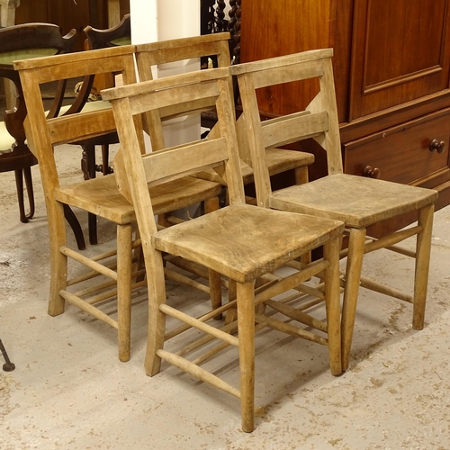 2542 - A set of 4 early 20th century elm-seated chapel chairs