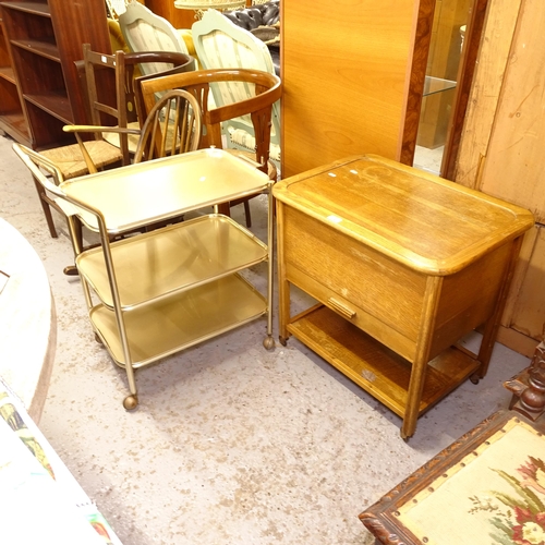 2548 - A 1920s oak sewing cabinet, and a mid-century 3-tier drinks trolley