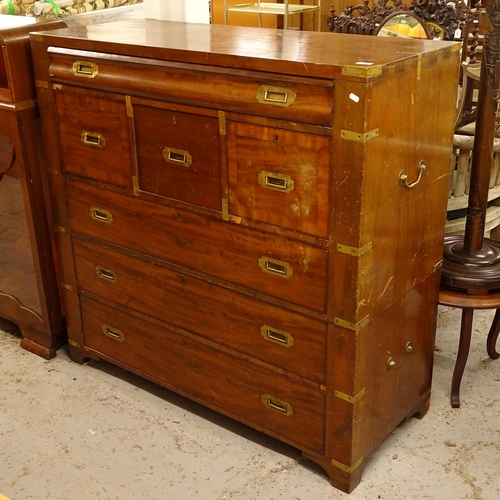 2570 - An Antique mahogany 2-section secretaire military chest, with recessed brass handles, and brass moun... 