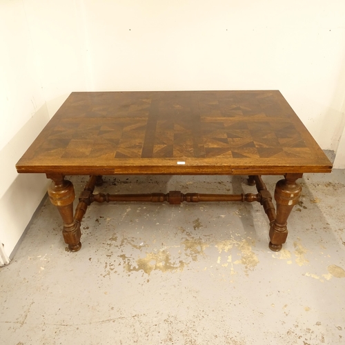 2582 - A large French oak draw leaf dining table, on baluster turned legs and stretchers, L160cm extending ... 