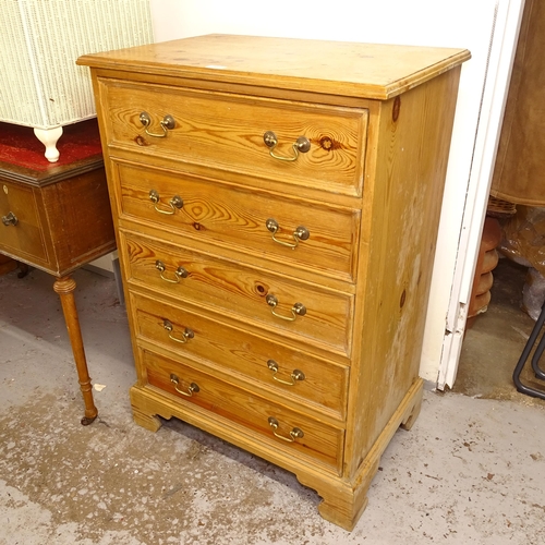 2585 - A waxed pine chest of 5 long drawers, W71cm, H104cm, D48cm