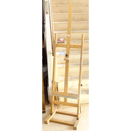 2629 - A beech artist's floor standing folding easel