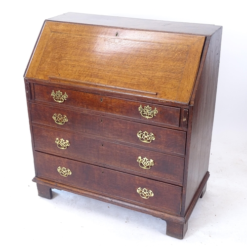 2078 - A Georgian oak bureau, with a crossbanded fitted interior, with 4 long drawers under, W97cm, H108cm,... 