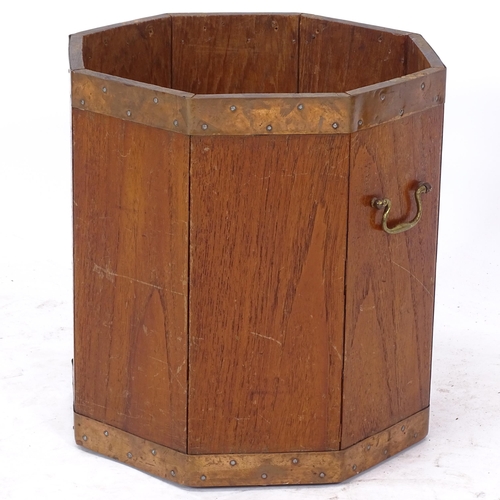 2103 - An octagonal teak and brass-bound litter bin, W32cm, H36cm