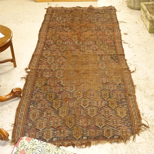 2605 - An Antique red ground Persian runner, 280cm x 110cm (A/F)