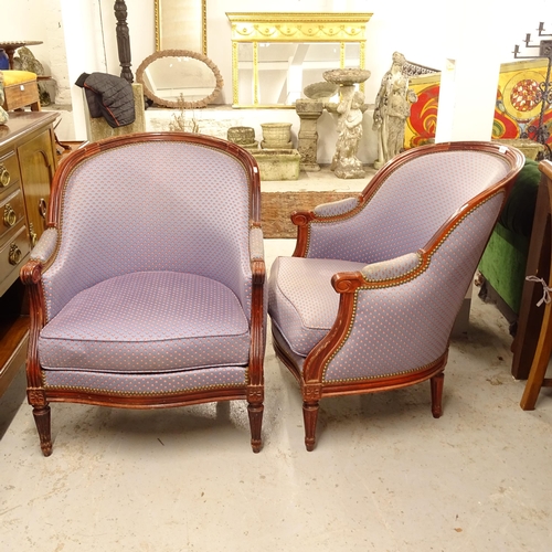 2618 - A pair of stained wood-framed and upholstered armchairs