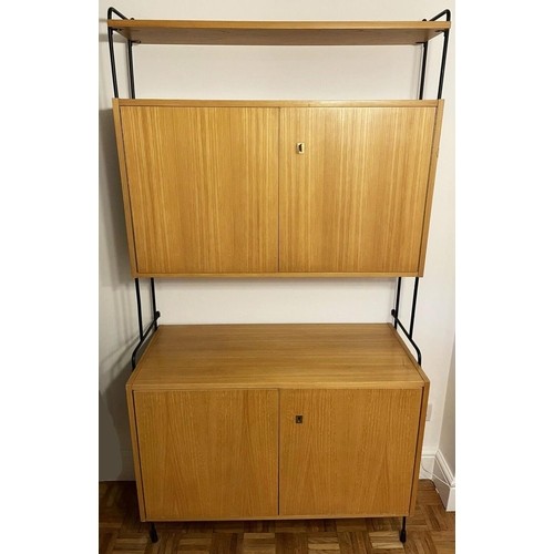 2574 - A mid-century Omnia wall unit, by Hilker, Germany, with maker's label, W88cm