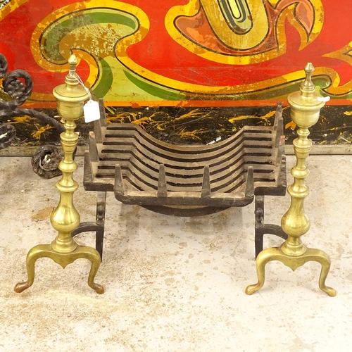 2590 - A cast-iron duck's nest fire grate, W46cm, H10cm, together with a pair of brass and cast-iron andiro... 