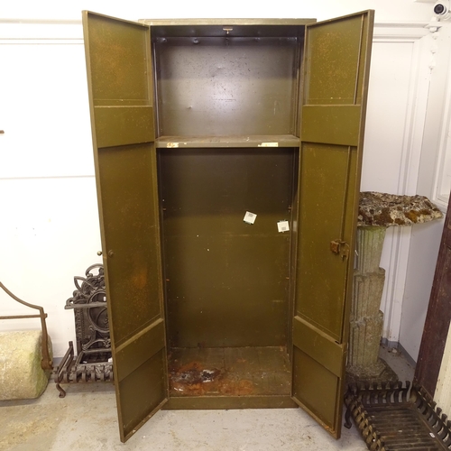 2625 - An industrial metal 2-door cabinet with 4 adjustable shelves, W71cm, H183cm, D46cm