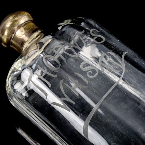 100 - Thorne's Whisky, Antique glass flask with etched advertising logo, plated screw-cap, height 23cm