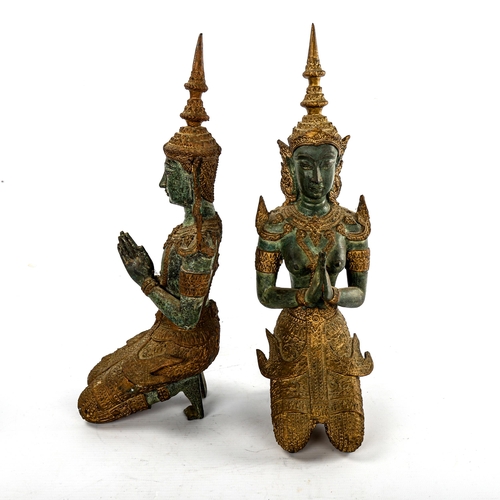 123 - A pair of Oriental gilt and verdigris bronze kneeling deities, height 34cm