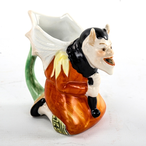 130 - Schafer Vater, German bisque porcelain devil design milk jug, height 9cm