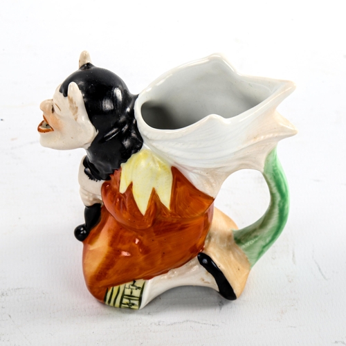 130 - Schafer Vater, German bisque porcelain devil design milk jug, height 9cm