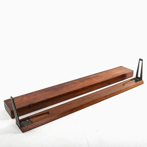 132 - A surveyor's alidade, in original mahogany case, case length 53cm