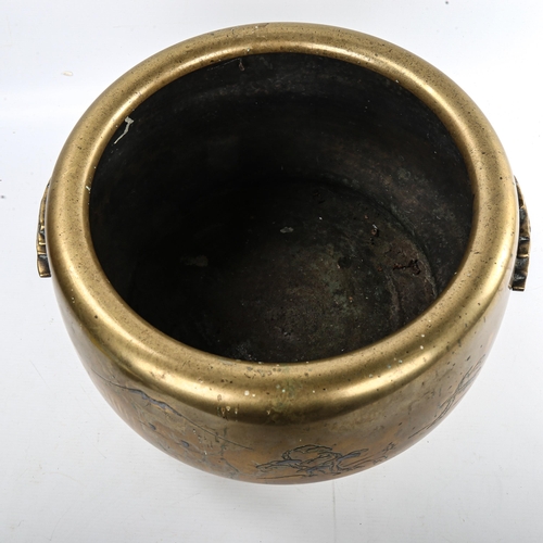 142 - A large Japanese bronze jardiniere, engraved mountain landscapes and cast handles, diameter 35cm, he... 