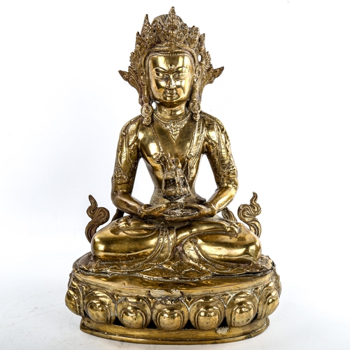 147 - A Chinese polished bronze seated Buddha, height 39cm