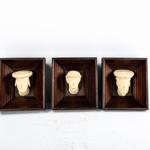 164 - 3 terracotta Medieval type heads mounted in wood frames, overall 13cm x 11cm