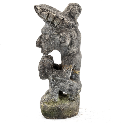 166 - A South American pottery Tribal figure holding a child, height 22cm