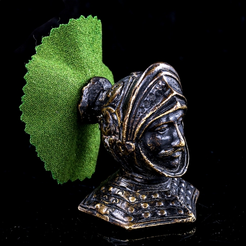 168 - WITHDRAWN - A Victorian cast-bronze desk pen wipe in the form of a knight in armour, height 6.5cm