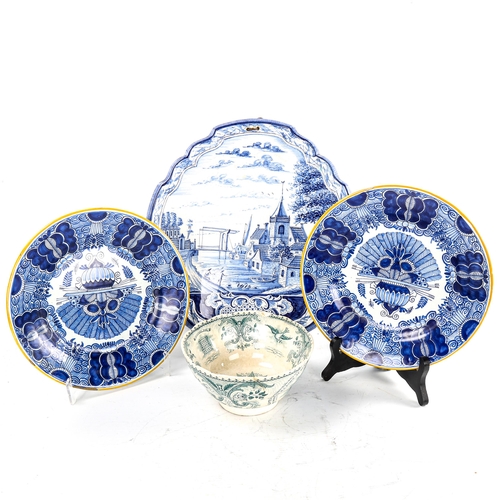 171 - A pair of Makkum Tichelaar Delft plates, diameter 23cm, a Delft pottery wall plaque, height 36cm, an... 