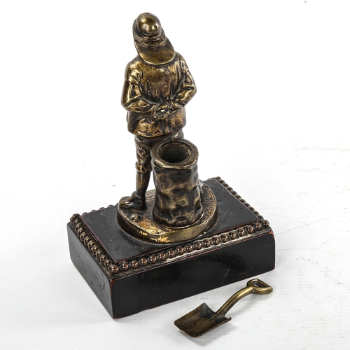 176 - A Victorian cast-brass Vesta stand, in the form of a fisherman, on stained wood base, height 15cm