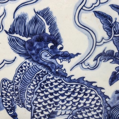 183 - A Chinese blue and white porcelain dragon bowl, diameter 27cm