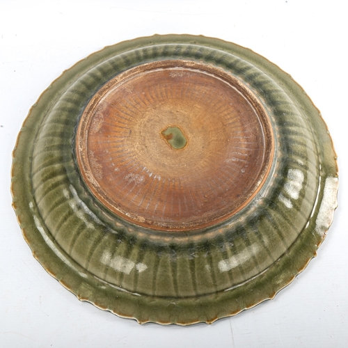 184 - A Chinese celadon glaze porcelain bowl, with relief moulded fish design, diameter 44cm