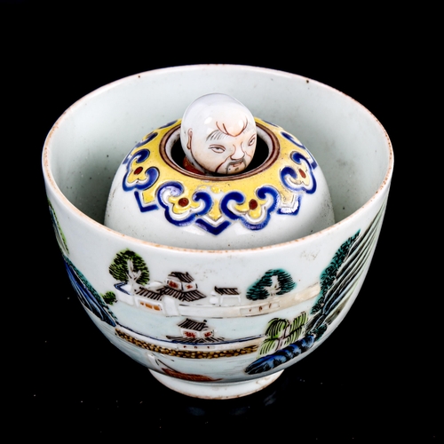 192 - A Chinese white glaze porcelain brush washer bowl, with rising figure in the centre, seal mark under... 