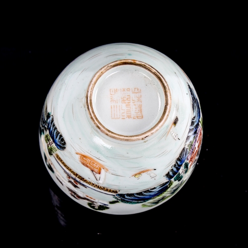 192 - A Chinese white glaze porcelain brush washer bowl, with rising figure in the centre, seal mark under... 