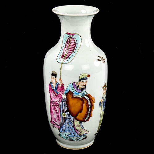 193 - A Chinese white glaze porcelain vase, with painted Court figures, height 23.5cm