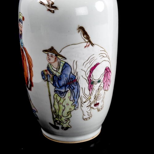 193 - A Chinese white glaze porcelain vase, with painted Court figures, height 23.5cm