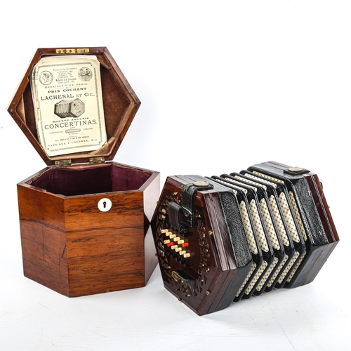38 - Lachenal & Co concertina, hexagonal rosewood and leather, 16cm across, in original hexagonal rosewoo... 