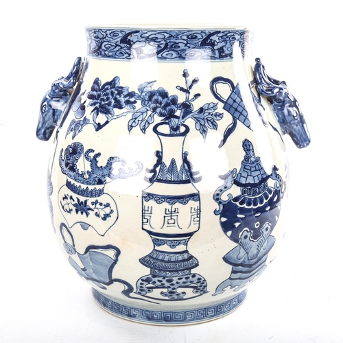 64 - A large Japanese blue and white porcelain vase, with stag's head handles, and 6 character mark, heig... 