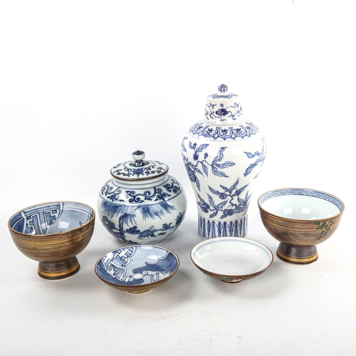 67 - A group of Japanese porcelain items, largest jar and cover height 23cm (4)