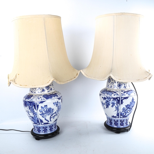 71 - A pair of Chinese blue and white porcelain table lamps and shades, overall height including shade 61... 